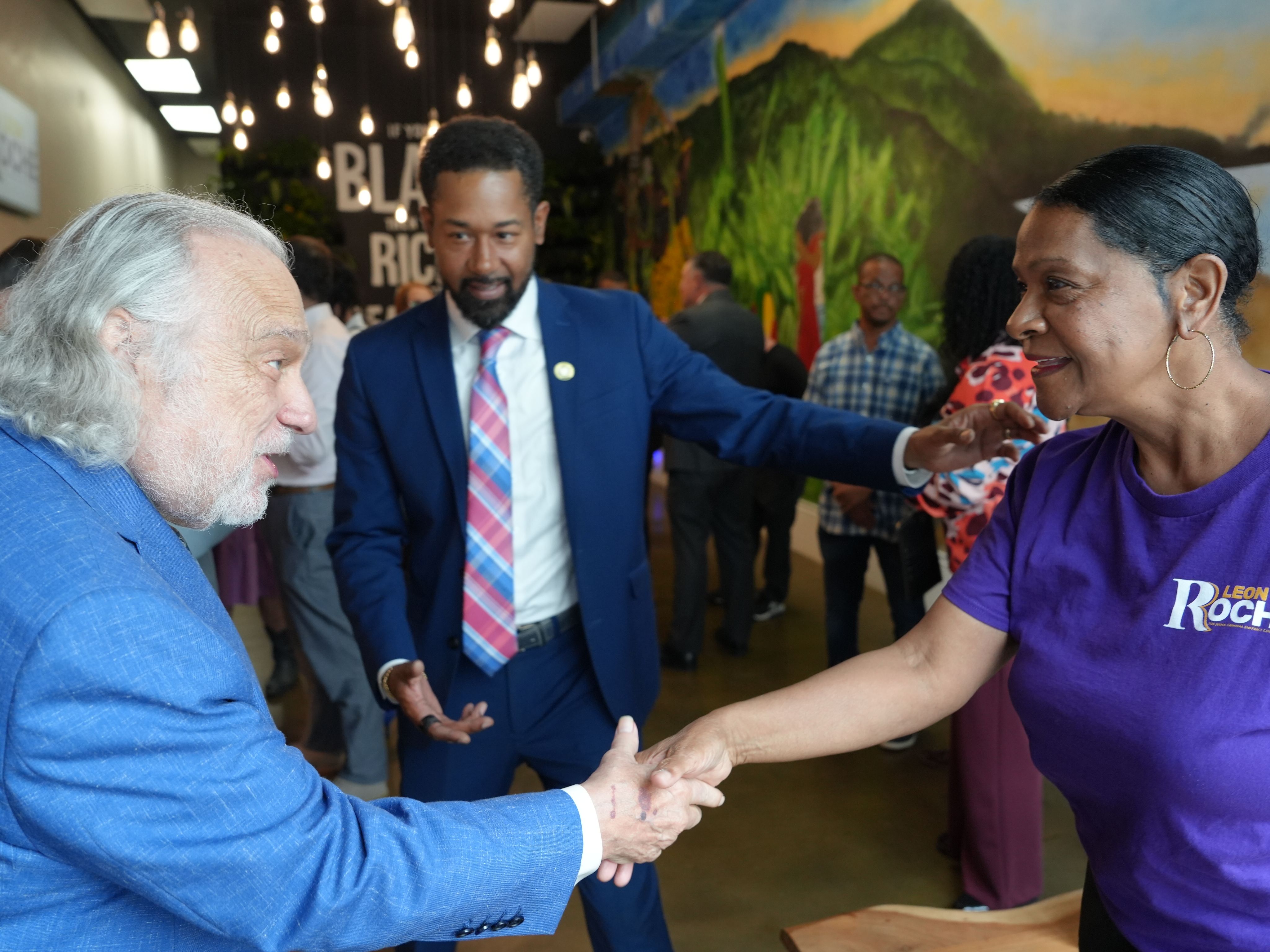 Judge Roché greeting supporters